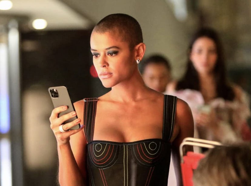 Jordan Alexander looks at a phone during a scene of HBO Max's 'Gossip Girl' reboot, which sparked th...