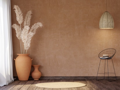 Terracotta is a warm shade for your bedroom walls.