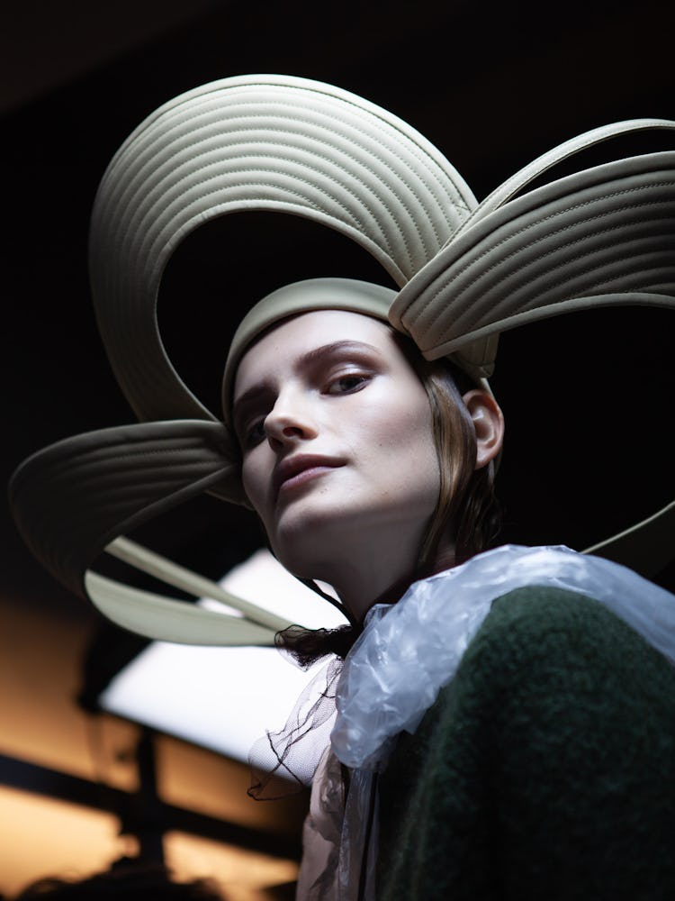 A model wearing a headpiece designed by Chitose Abe for Jean Paul Gaultier