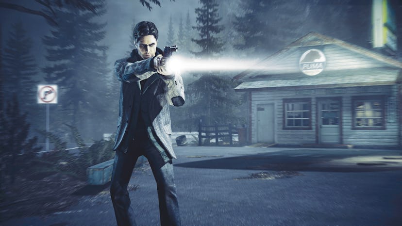 Alan Wake pointing flashlight and gun in front of him.