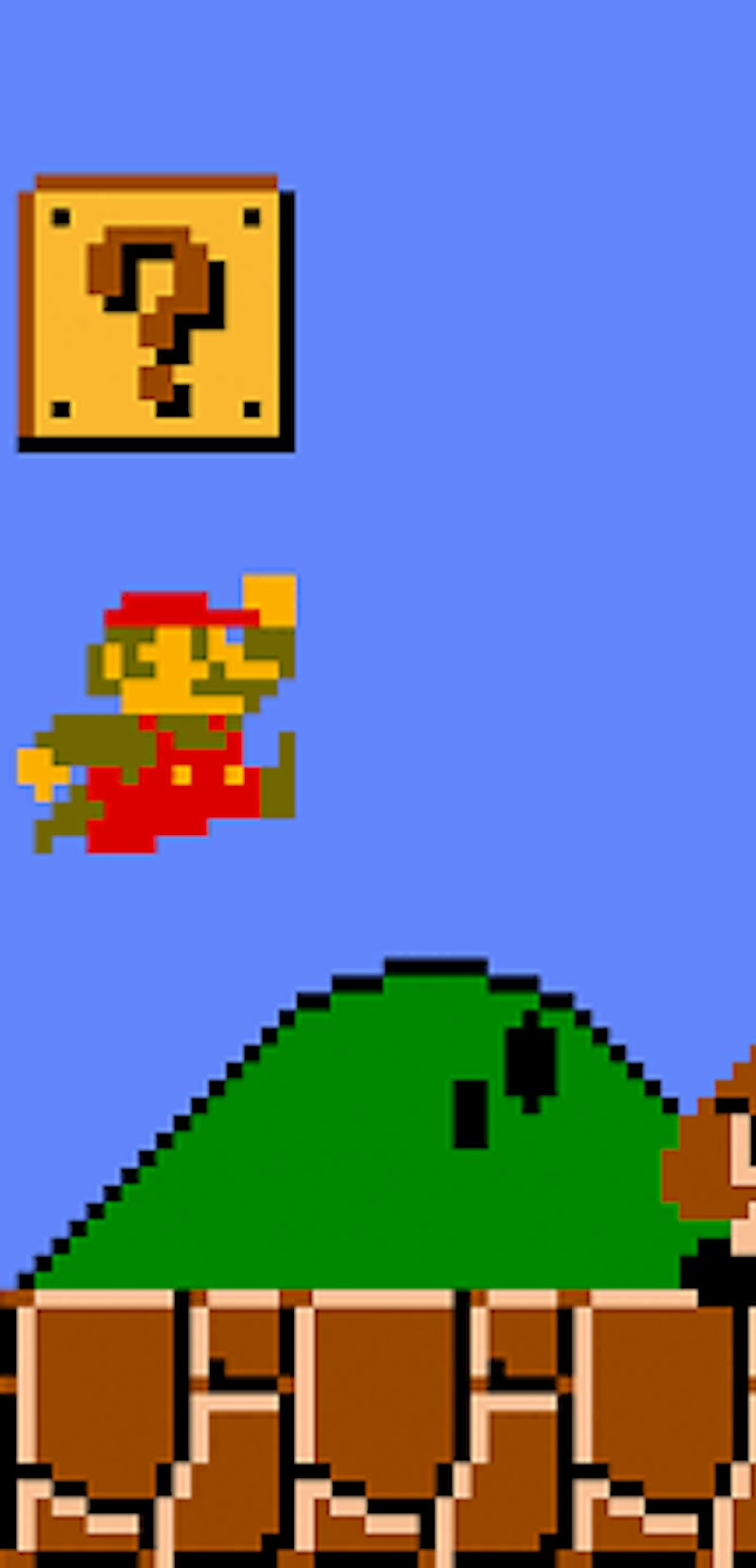 Mario jumping over goomba in Super Mario Bros.