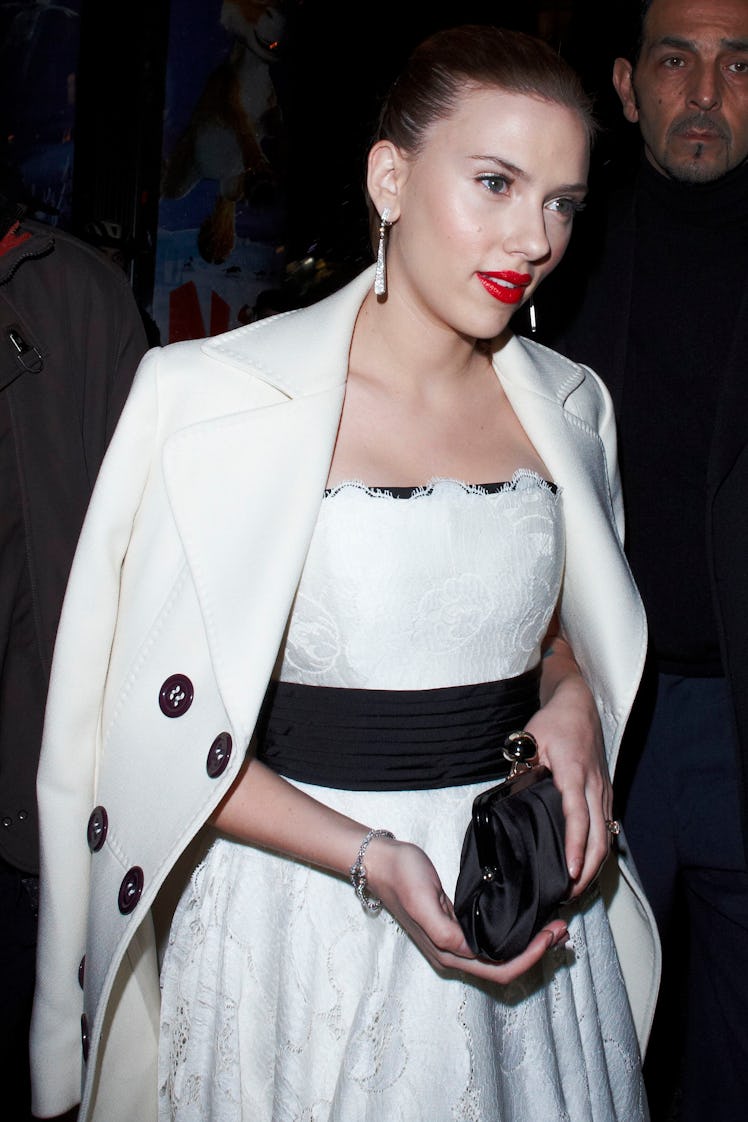 Scarlett in white coat. 