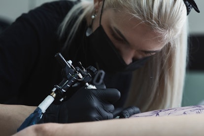 Here's what you should know before getting a tattoo inside your lip.