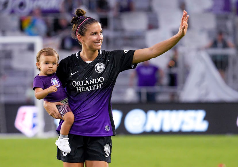 Orlando Pride forward Alex Morgan (13) and her daughter Charlie after the NWSL soccer match between ...