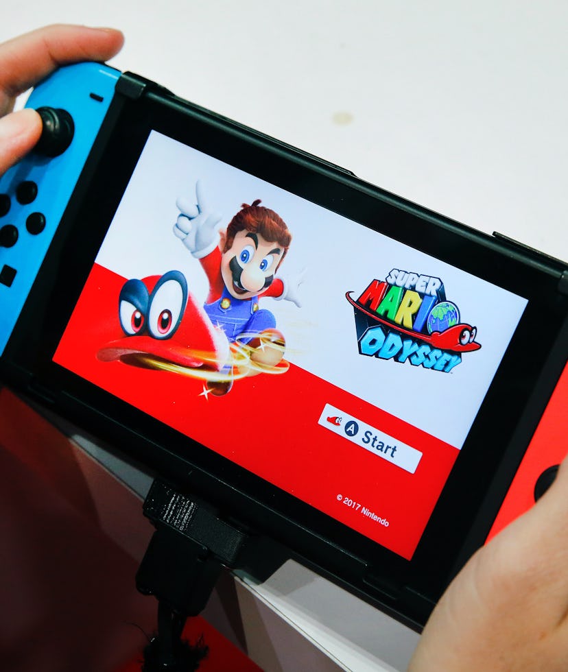 Nintendo Switch running Super Mario Odyssey. Gaming. Video games. Hardware.