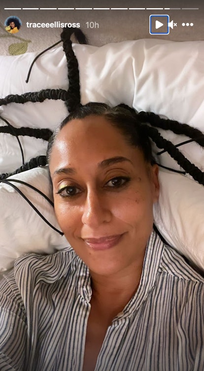 Tracee Ellis Ross in a black-white striped shirt and a sculptural updo for Pyer Ross Instagram story...