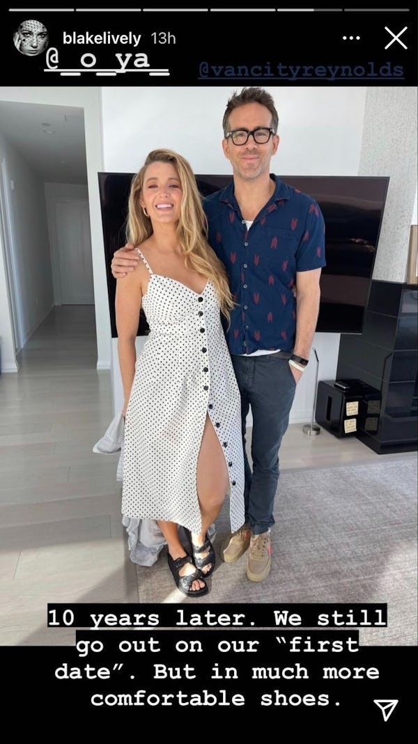 Blake Lively and Ryan Reynolds pose for an anniversary date photo.