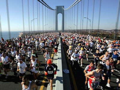  Runners stream over the Verrazano Narrows Bridge at the start of the New York City Marathon