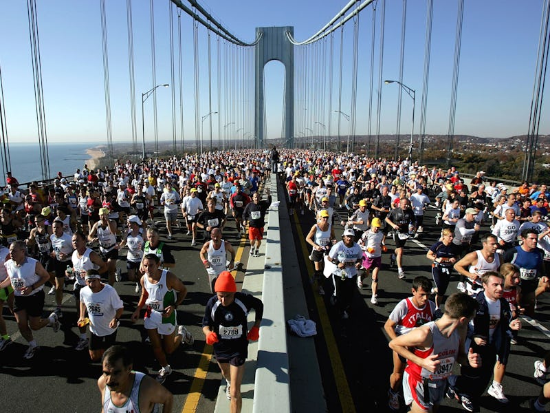 Runners stream over the Verrazano Narrows Bridge at the start of the New York City Marathon