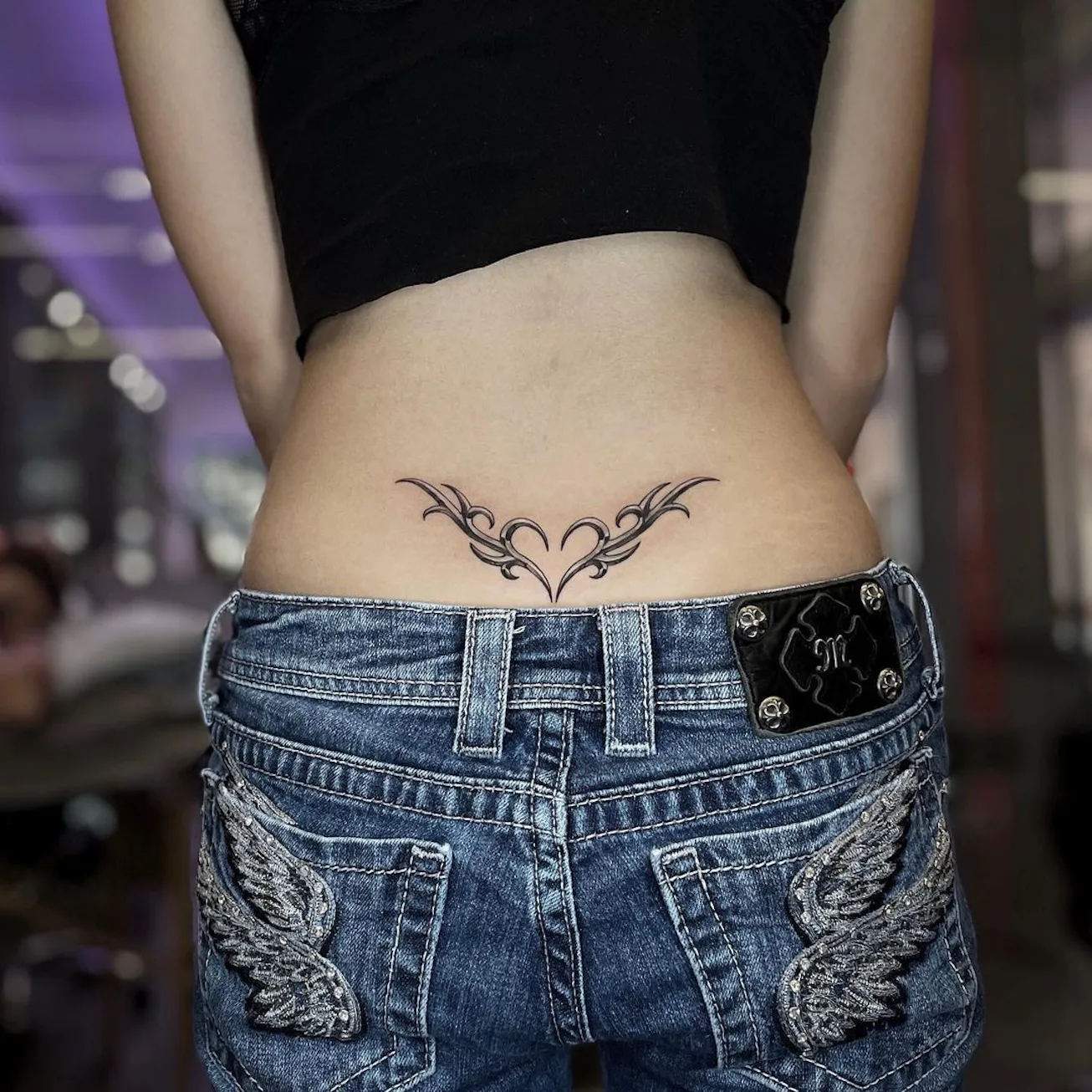 11 Tramp Stamp Tattoo Ideas to Usher in Their Inevitable Return