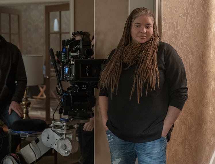 Liesl Tommy standing in front of a camera looking to the side