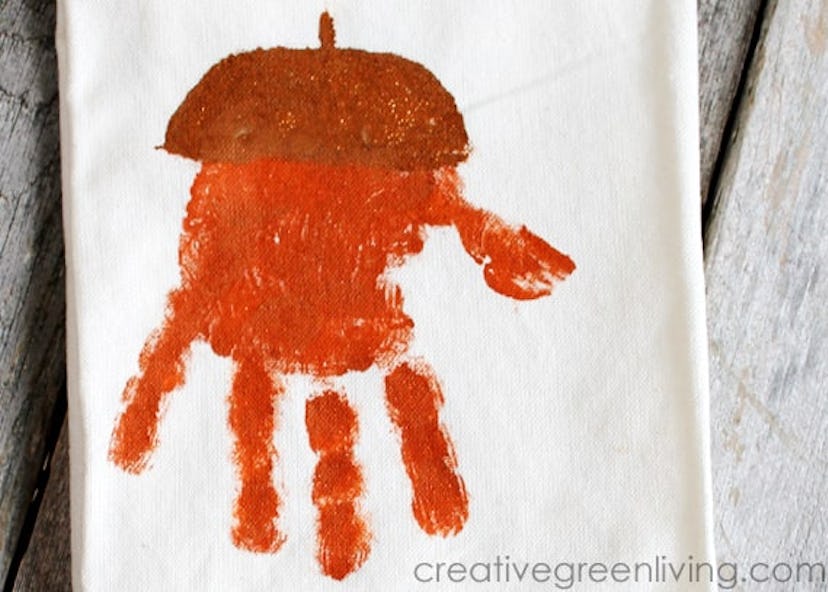 A handprint kitchen towel is a Halloween handprint art idea to try.