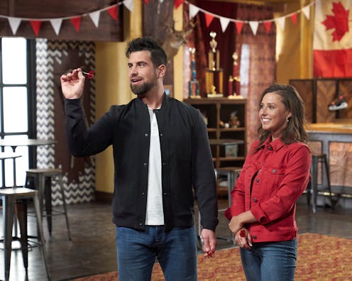 Bachelorette contestant Blake playing darts with Bachelorette Katie