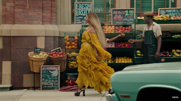 Beyonce in the "Hold Up" music video in her yellow dress.