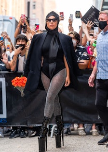 Lady Gaga in black headscarf.