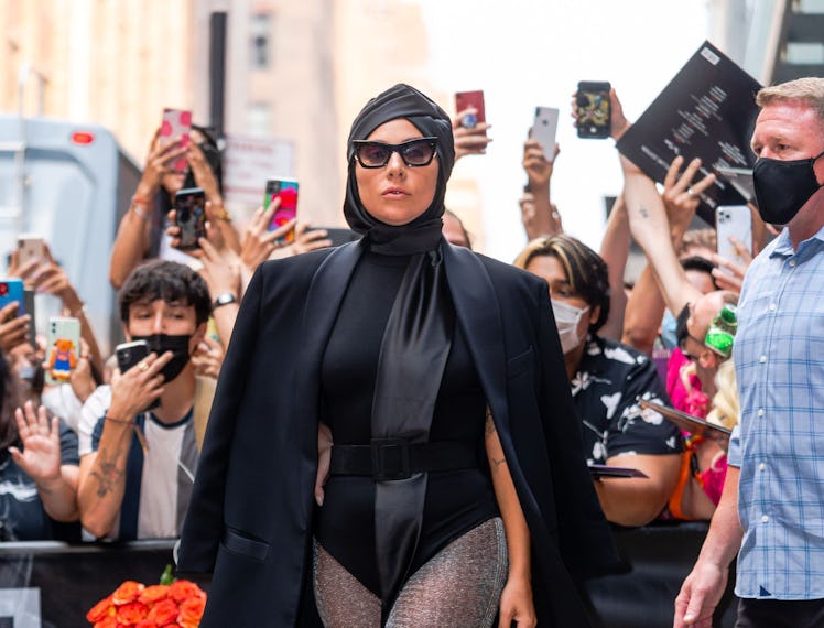 Lady Gaga in black headscarf.