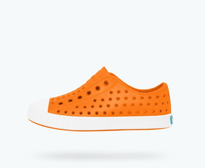 rubber slip on sneaker with holes in it from Native