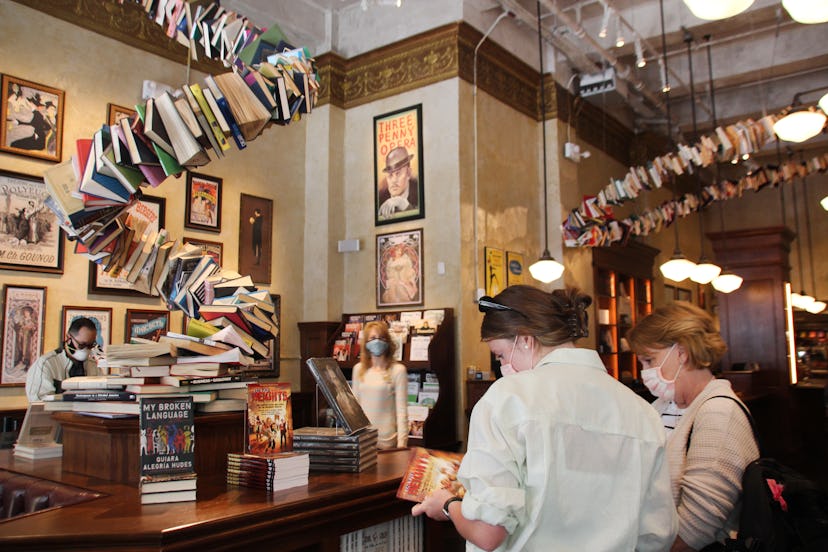 Visitors stand in the "Drama Book Shop" bookstore in June 2021.