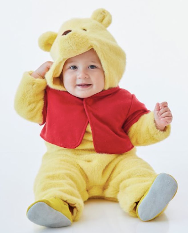 Baby wearing Pooh Bear costume