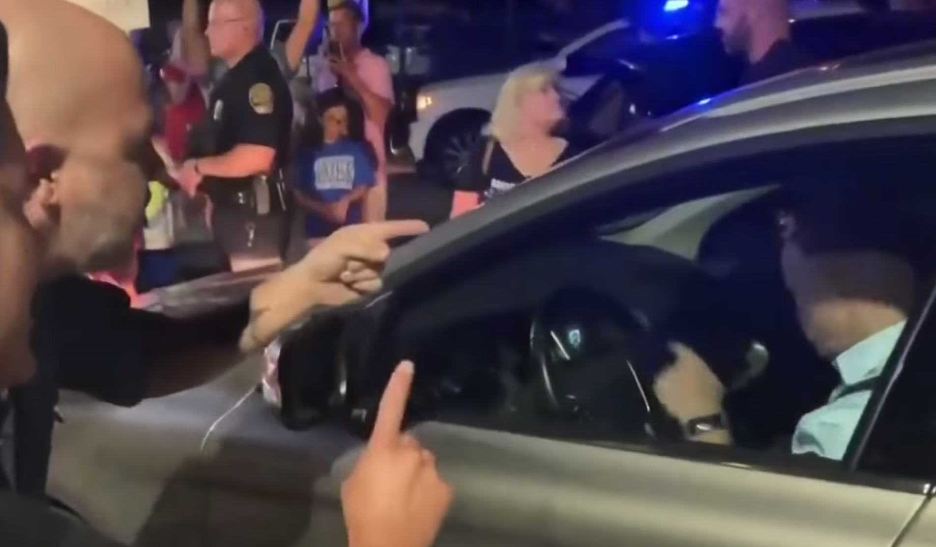 Anti-mask protesters accosted parents in support of mandating masks outside of a school board meetin...