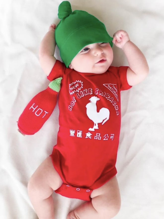 Newborn dressed in a Sriracha bottle costume