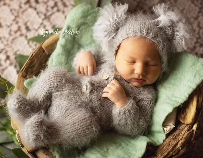 Newborn dressed as a koala