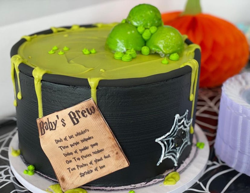 Cake made to look like a witch cauldron making "baby's brew" 