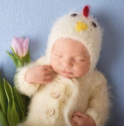 Newborn dressed as a baby chick