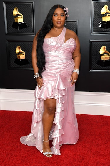 Lizzo in pink red carpet gown. 