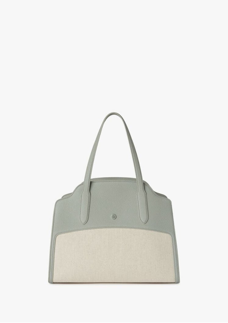Loro Piana's Sesia Bag in the color natural/eucalyptus.