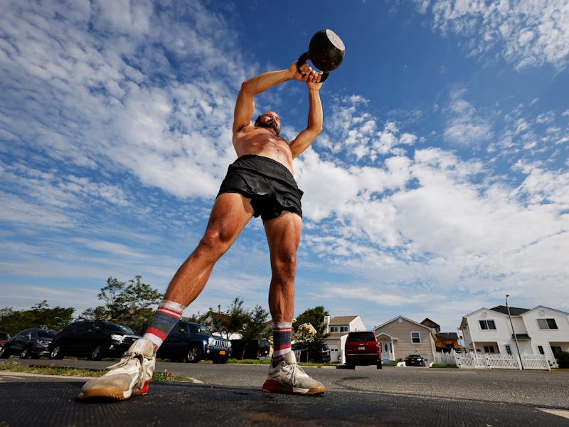 CrossFit athlete Rick Loomis performs a Russian Kettlebell swing.