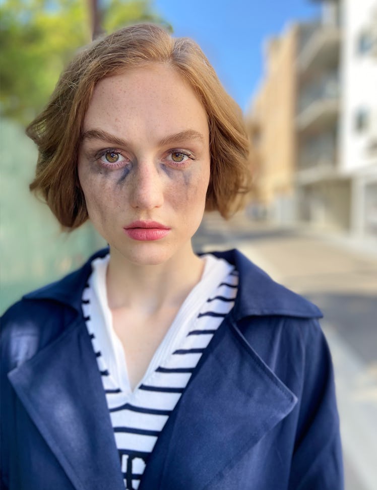 Madison Lintz as Fleabag character from the Fleabag movie, wearing a Max Mara blue jacket and Dior s...