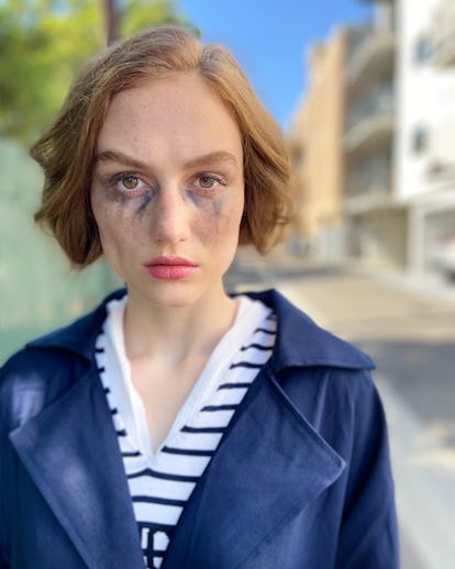 Madison Lintz as Fleabag character from the Fleabag movie, wearing a Max Mara blue jacket and Dior s...