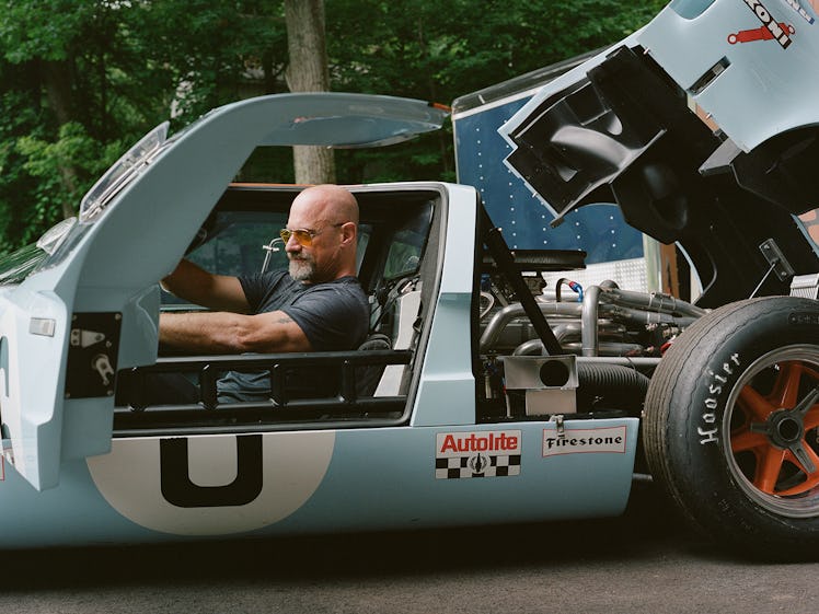 Christopher Meloni driving a racing car
