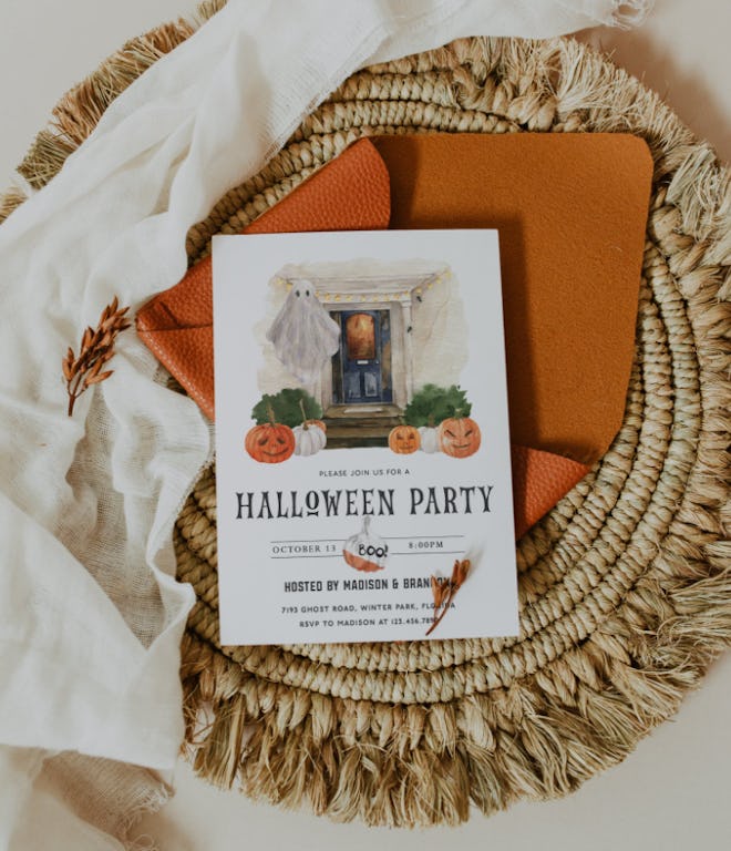 Halloween party invitation; sitting on a natural place mat with white background
