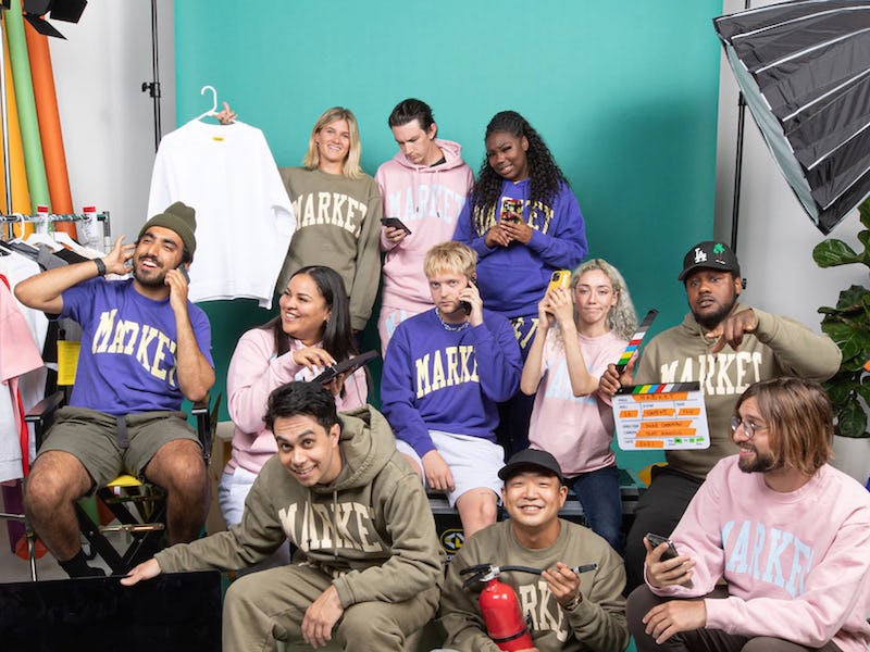 MARKET team wearing MARKET branded sweatshirts