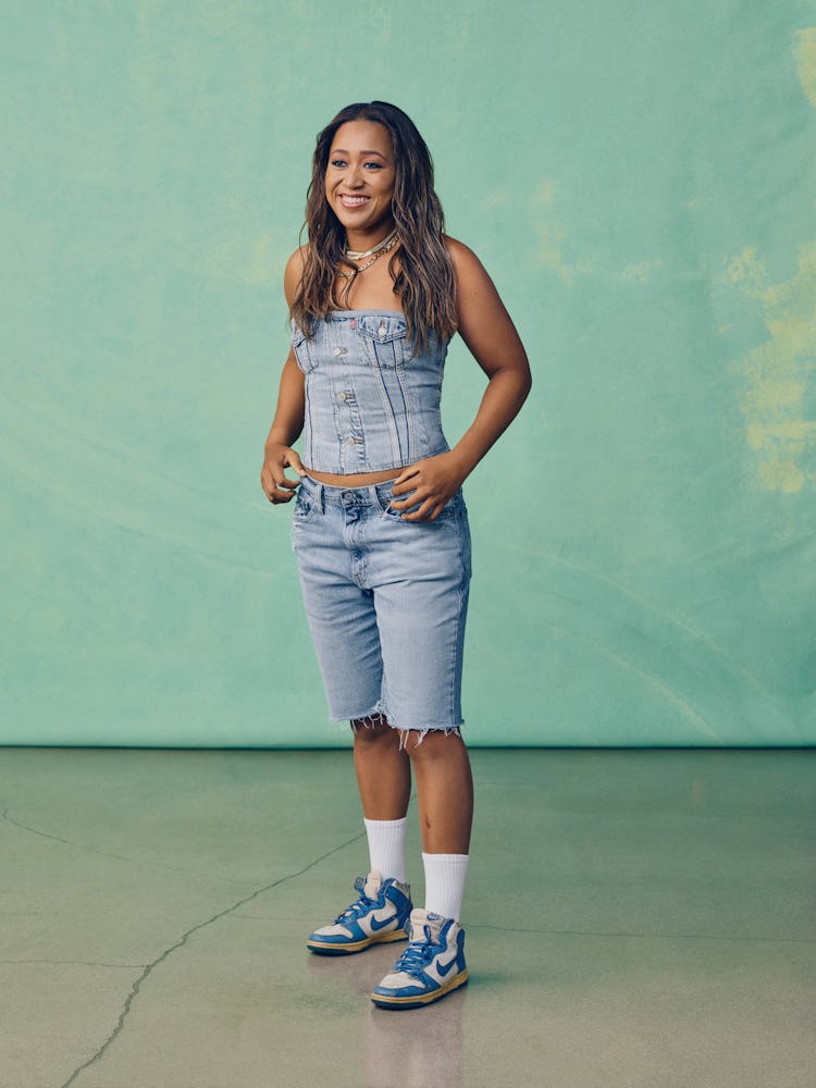 Tennis star Naomi Osaka wears trucker jacket buster and knee-length shorts in the campaign for her L...