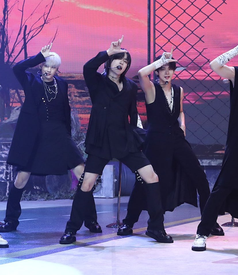 A screenshot from TXT's "Loser=Lover" media showcase performance.