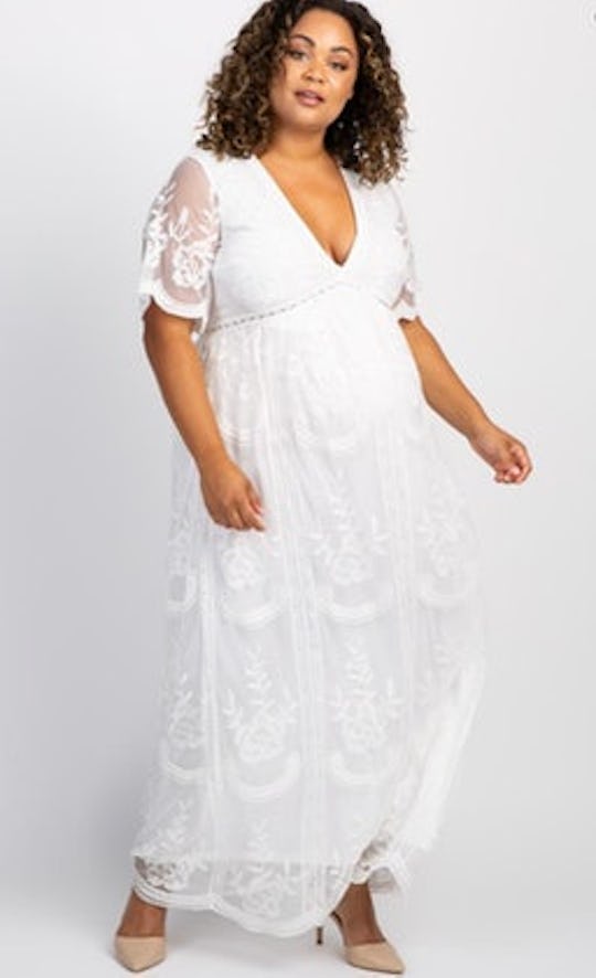 woman in white maternity dress