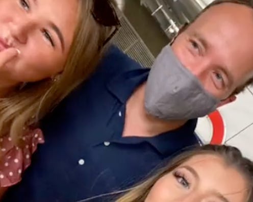 Mat Hancock poses with two blonde women.
