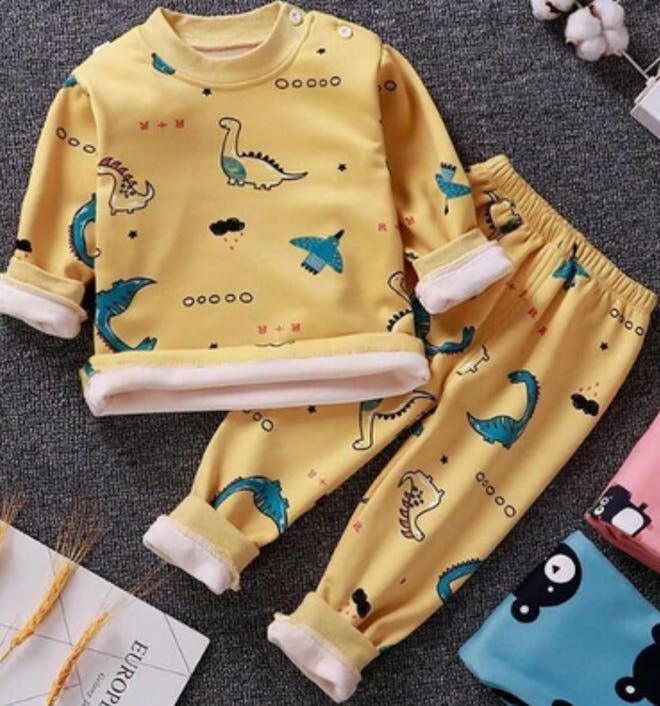 Image of young kid's yellow two-piece flannel-cotton pajama set from Tiny Jumps.