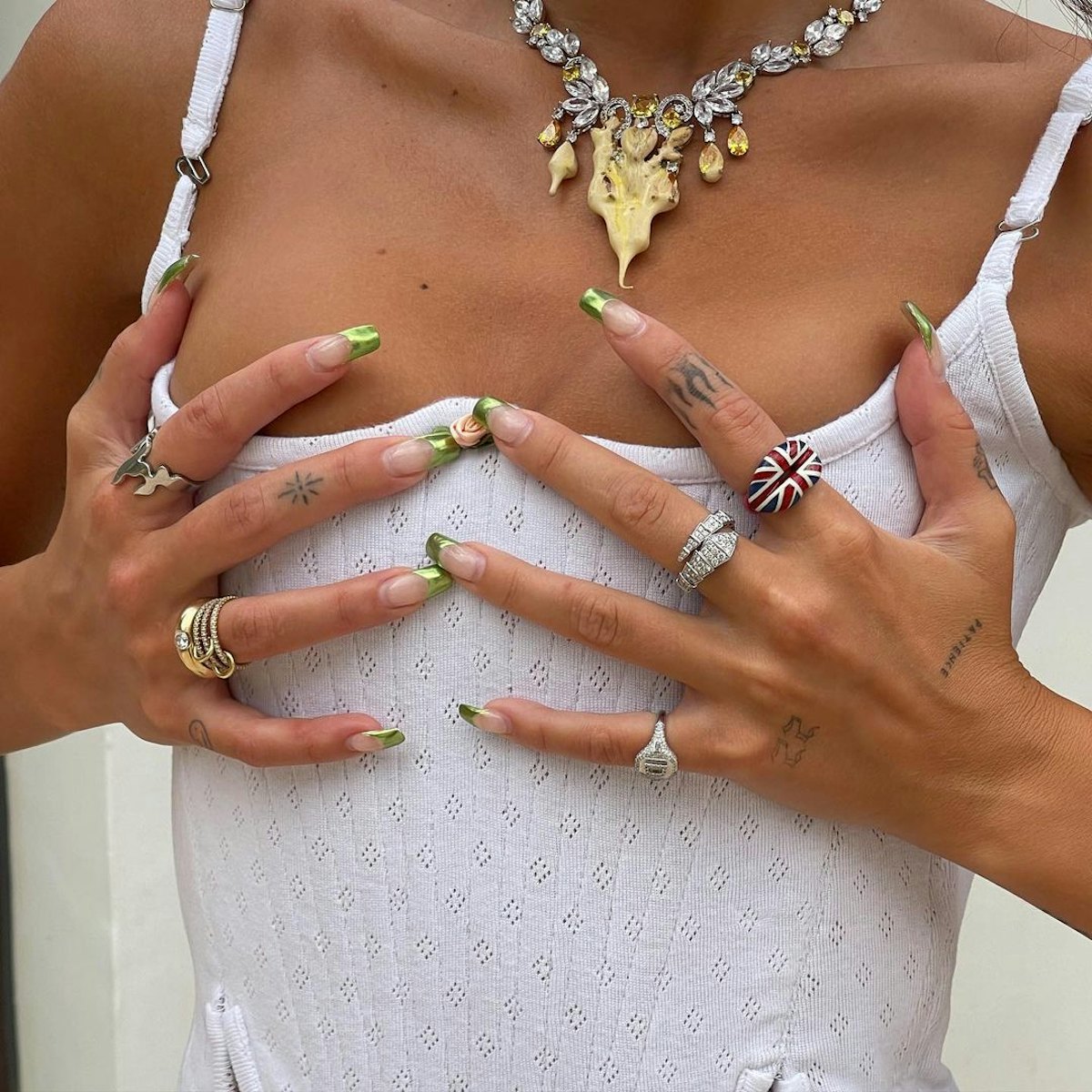 Dua Lipa showing off her jewelry