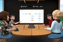 Four virutal characters sit around a desk looking at a chart projected onto a display in front of th...