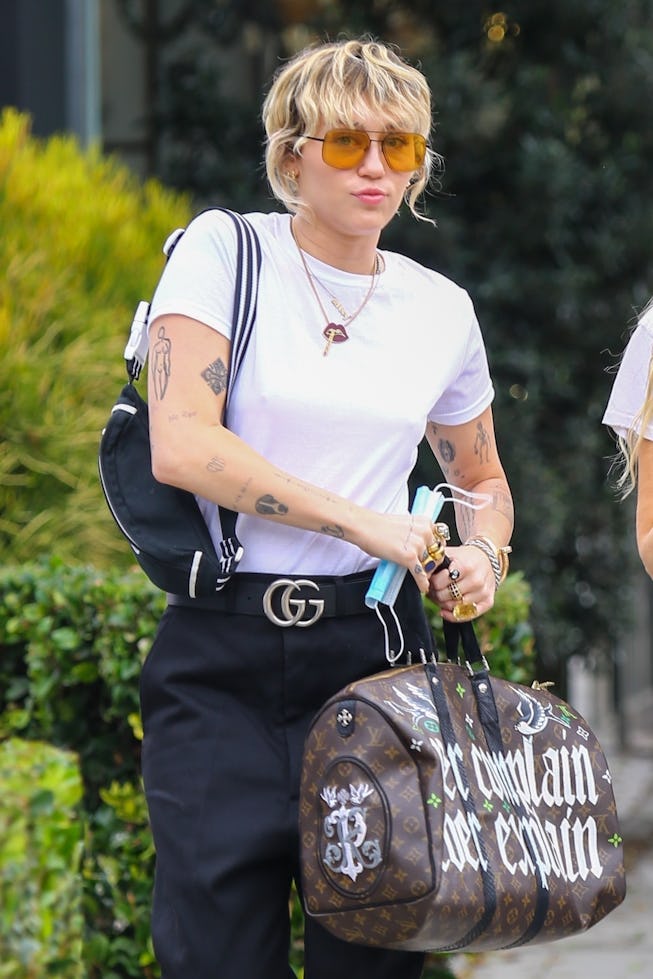 Miley Cyrus' Shopping Look Includes A Vintage Chanel Tennis Bag