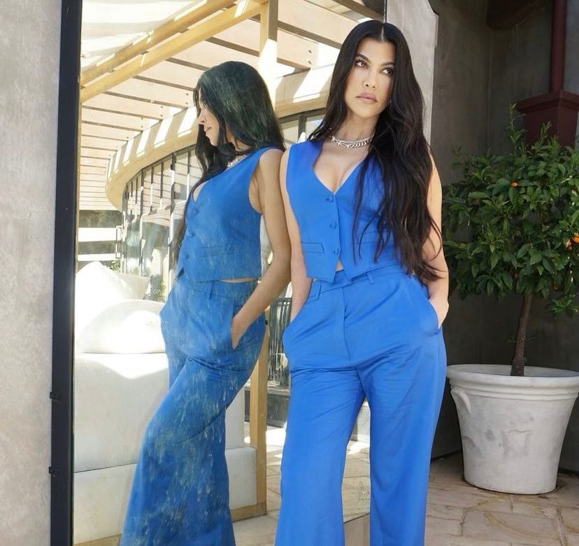 Kourtney Kardashian wears a blue jumpsuit in her Instagram.