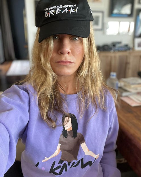 Jennifer Aniston wears 'Friends' merch from the show's official collection.