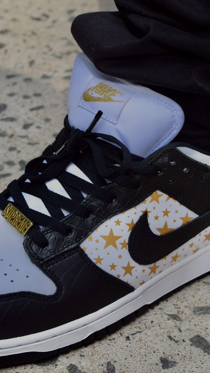 Supreme Nike SB Dunk Low stars black on feet review