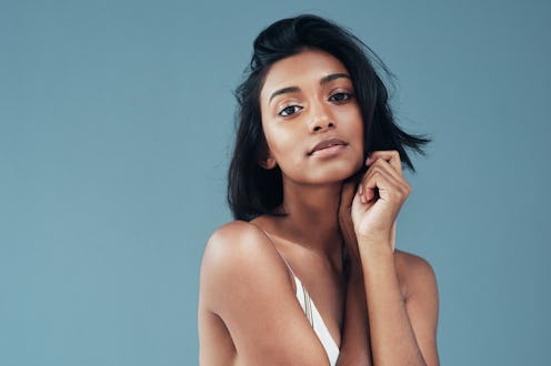 Dermatologists compare face oils vs. serums and how to use each in your beauty routine.