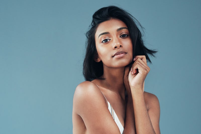 Dermatologists compare face oils vs. serums and how to use each in your beauty routine.