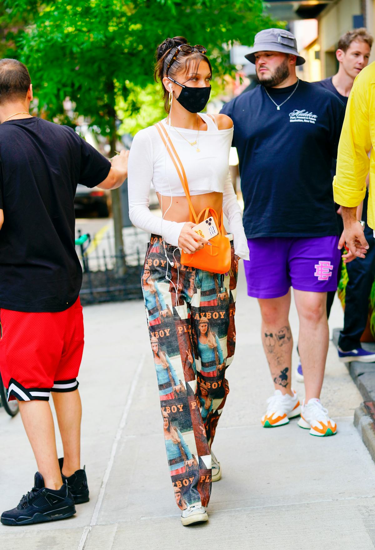 Bella Hadid with an orange Telfar bag. 